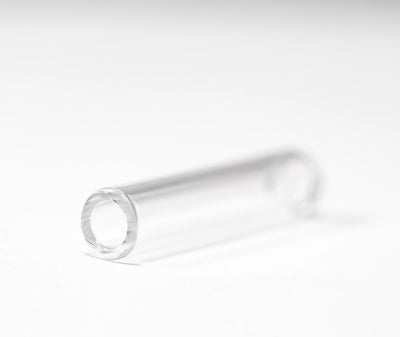 Close-up of Hitoki Saber Bubbler Glass Stem replacement highlighting smooth cylindrical design and durable transparent glass.