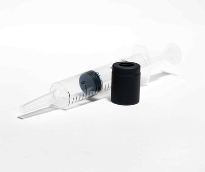 Full Hitoki Cleaning Kit showing syringe, adapter, and components arranged neatly on white background.