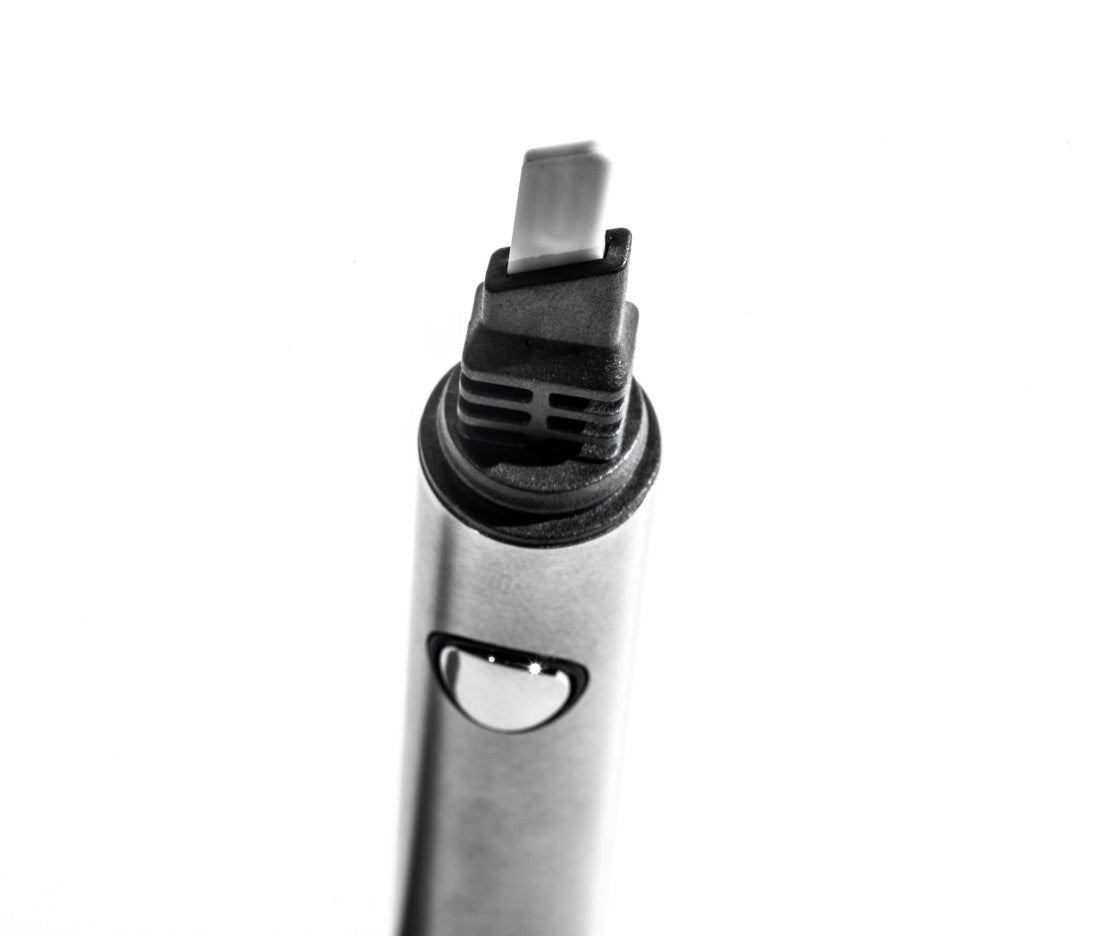 Close-up view of the Hitoki Dab Pen’s heated blade and button detail.