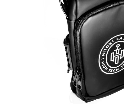 Close-up of Hitoki Essentials Bag zipper, highlighting secure compartment for accessories.